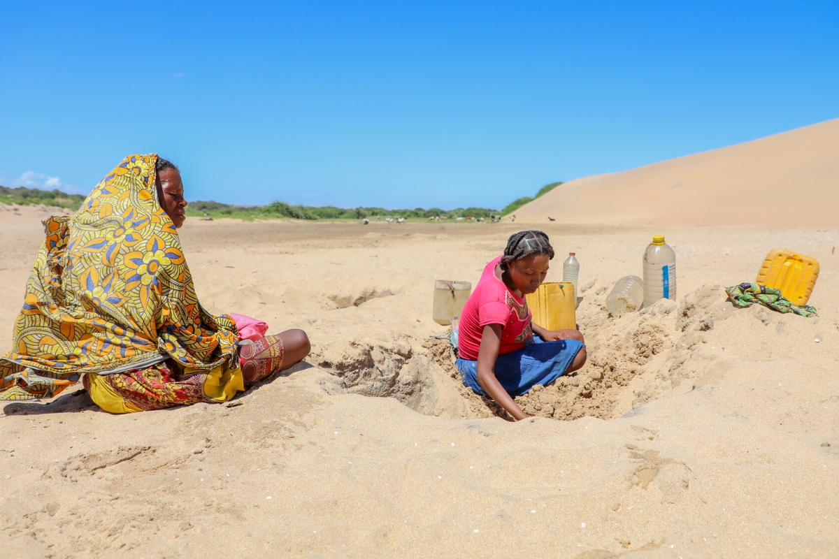 Women source water in Madagascar.
