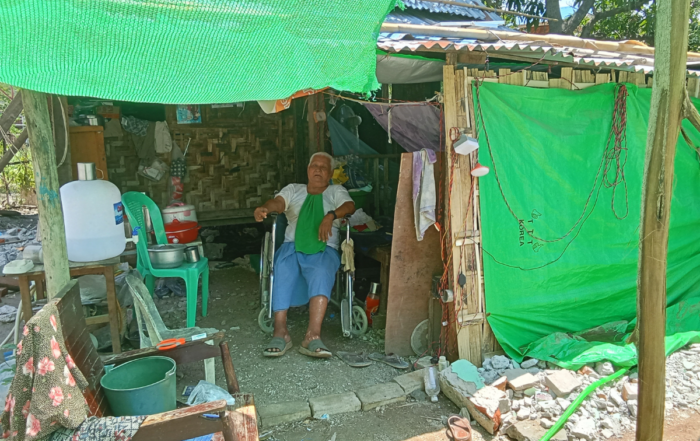 Naw's mother in her shelter