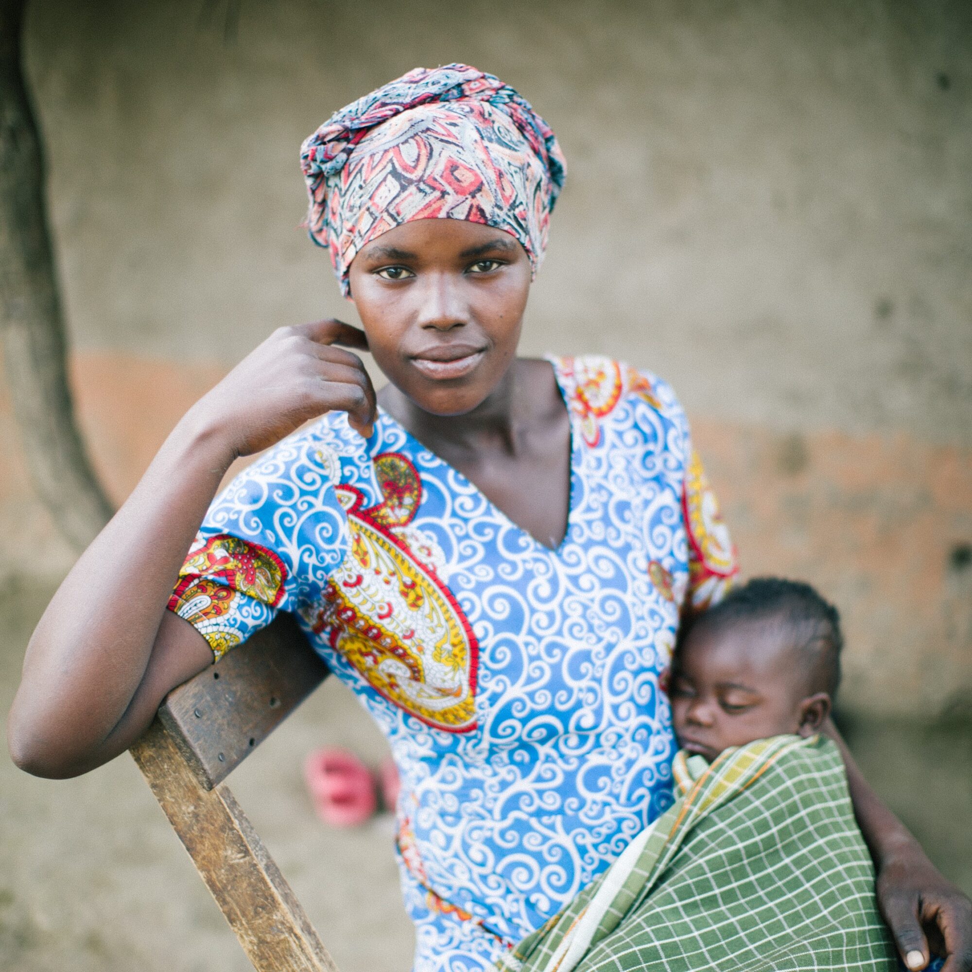 mom holding infant