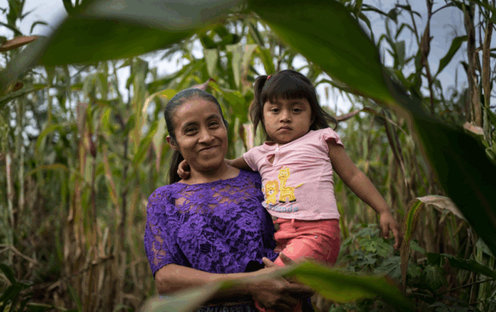 A mother holds her daughter